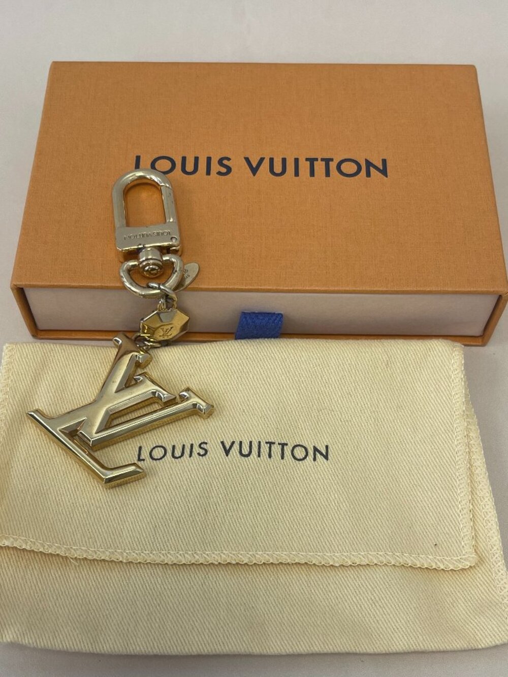 LV Facettes Bag Charm & Key Holder in Gold Tone - Preowned